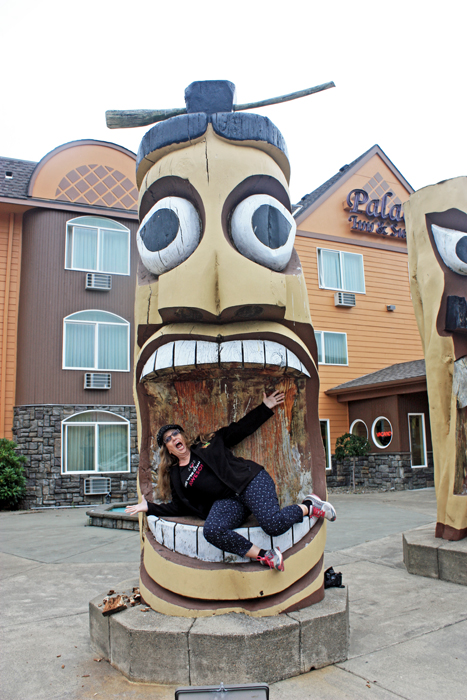 This totem pole is trying to eat Karen Duquette